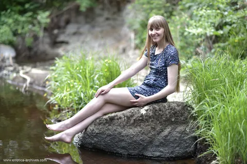 Woman Strips Out of Her Skirt and Poses Nude Outdoors – photo 3 of 16