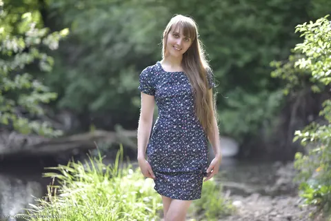 Woman Strips Out of Her Skirt and Poses Nude Outdoors – photo 16 of 16