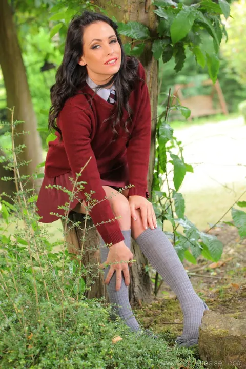 Busty Brunette Flaunts Her Ass in a Uniform and Heels Outdoors – photo 3 of 16