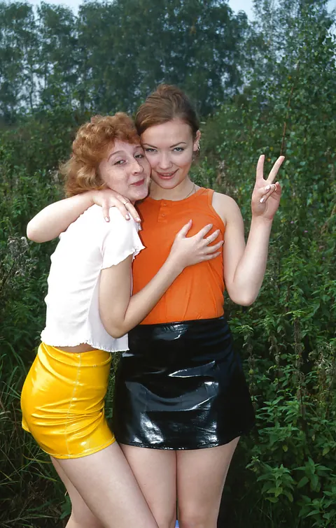 Women in Skirts Share Lesbian Sex Outdoors – photo 1 of 16