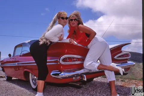 Jill Kelly: Two Busty Hairy Blondes Strip and Eat Pussy in the Car – photo 3 of 21