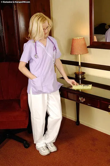 Blonde MILF Strips Out of Her Nurse Uniform and Fingers Her Shaggy Pussy