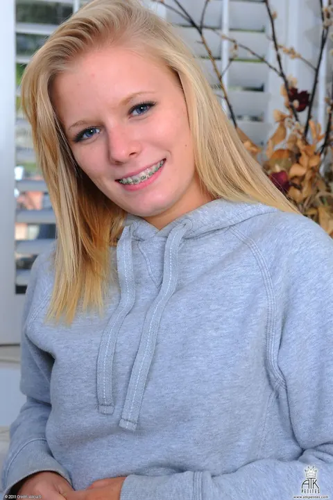 Elaina Raye: Petite Blonde with Small Tits and a Tattoo Strips and Poses Nude – photo 1 of 21