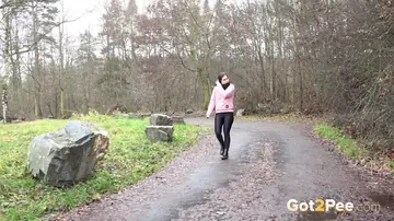 Skinny European Brunette Spreads Her Legs and Pees on Outdoor Path