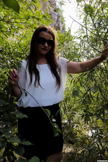 Woman in Glasses Sucks Two Cocks Outdoors