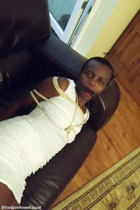 Ebony Brunette Spreads Her Legs While Bound and Cleave Gagged on Leather Sofa – photo 16 of 16