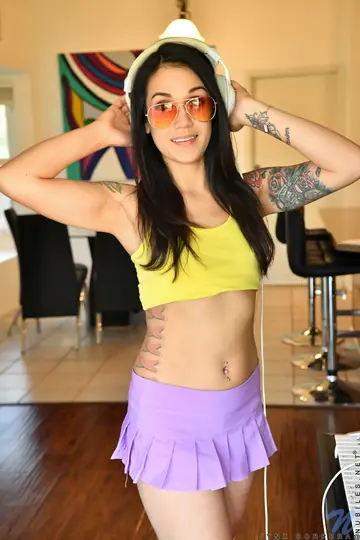 Petite Tattooed Brunette in Glasses Strips Off Her Skirt and Panties