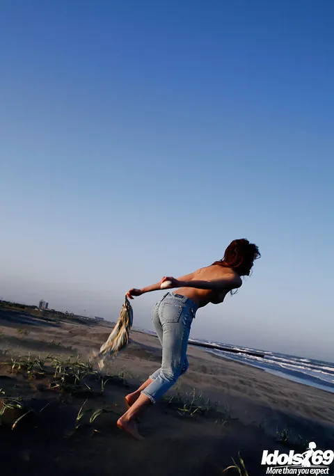 Yu Satome: Japanese Brunette Reveals Her Big Tits on the Beach – photo 9 of 14