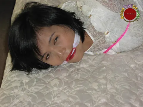Asian Brunette Tied Up and Cleave Gagged in the Bedroom – photo 12 of 16