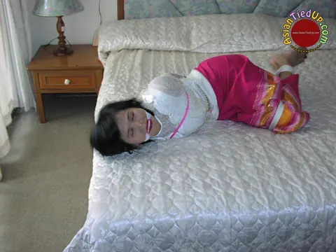 Asian Brunette Tied Up and Cleave Gagged in the Bedroom – photo 13 of 16