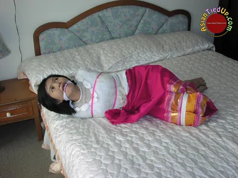 Asian Brunette Tied Up and Cleave Gagged in the Bedroom – photo 10 of 16