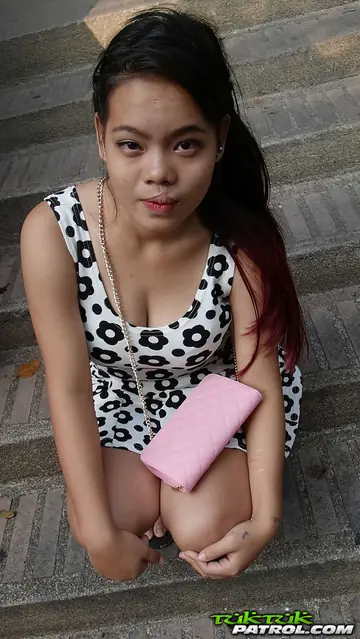 Asian Woman Strips Off Her Dress to Reveal Her Hairy Pussy