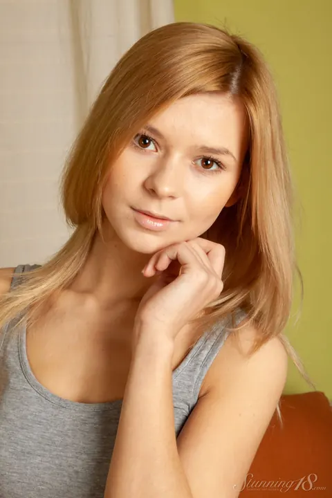 Lolly Hardcore: Blonde in Socks Shows Off Her Shaved Pussy on the Sofa – photo 2 of 16
