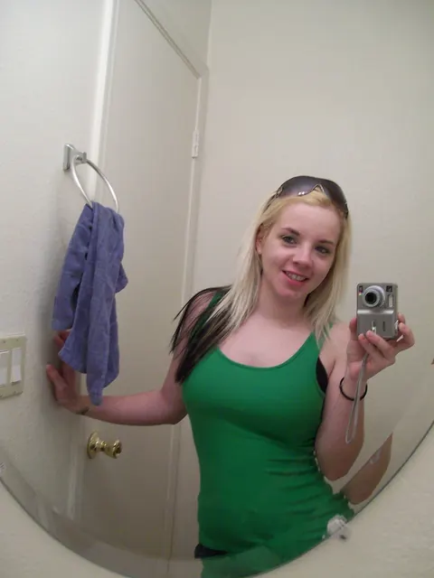 Sexy Starr: Brunette in Panties Reveals Her Enhanced Tits for Mirror Selfie – photo 1 of 20
