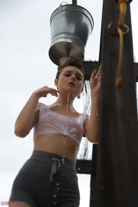Caterina Foxy: Short-Haired Redhead Strips Off Her Shorts Outdoors and Poses in the Bathroom – photo 4 of 12