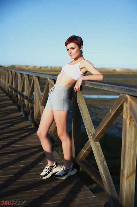 Caterina Foxy: Short-Haired Redhead Strips Off Her Shorts Outdoors and Poses in the Bathroom – photo 1 of 12
