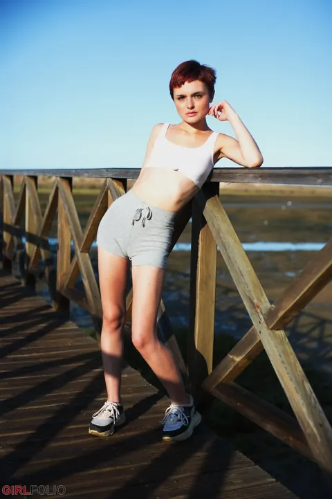Caterina Foxy: Short-Haired Redhead Strips Off Her Shorts Outdoors and Poses in the Bathroom – photo 2 of 12