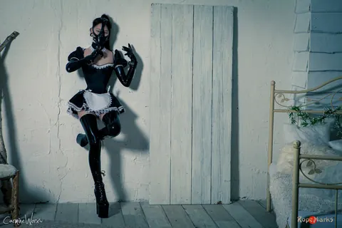 Korean Brunette Poses in Rubber Maid Uniform and Stockings – photo 15 of 16