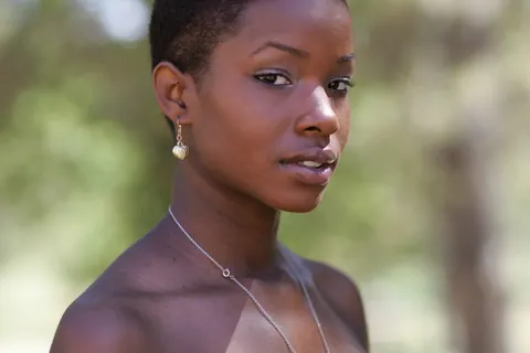 Ebony Woman with Short Hair Poses Fully Clothed – photo 3 of 20