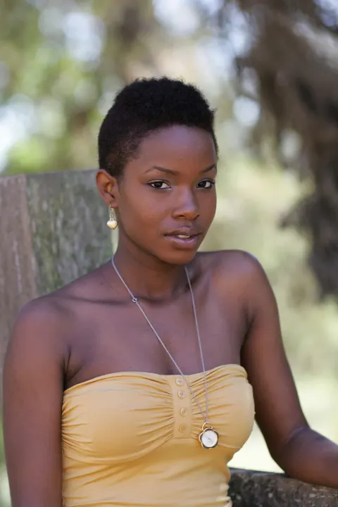 Ebony Woman with Short Hair Poses Fully Clothed – photo 5 of 20