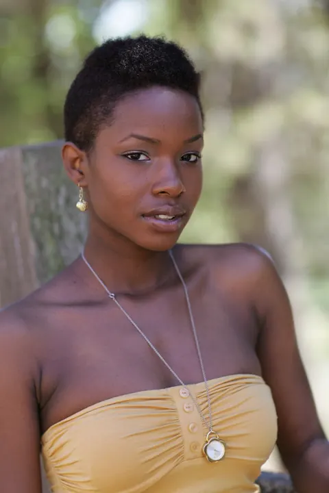 Ebony Woman with Short Hair Poses Fully Clothed – photo 6 of 20