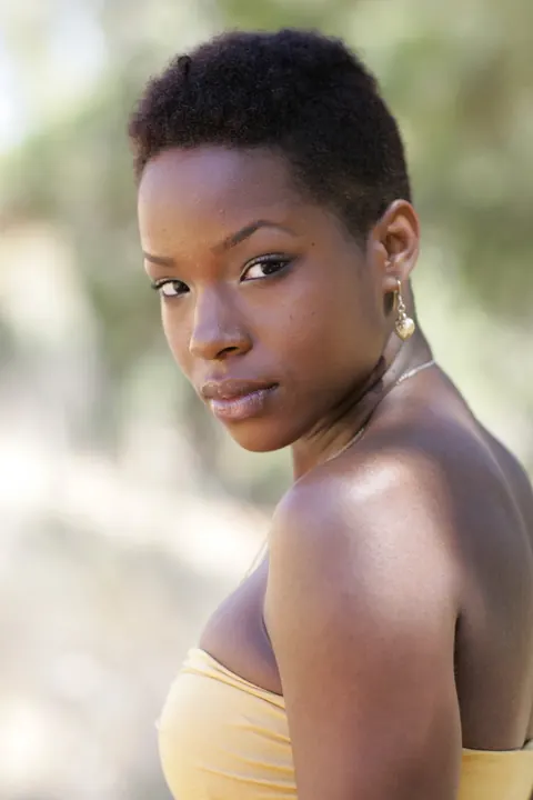 Ebony Woman with Short Hair Poses Fully Clothed – photo 12 of 20