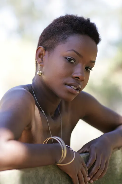 Ebony Woman with Short Hair Poses Fully Clothed – photo 18 of 20
