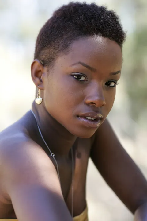 Ebony Woman with Short Hair Poses Fully Clothed – photo 15 of 20