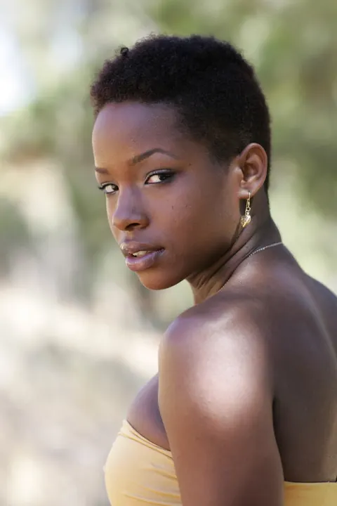 Ebony Woman with Short Hair Poses Fully Clothed – photo 13 of 20
