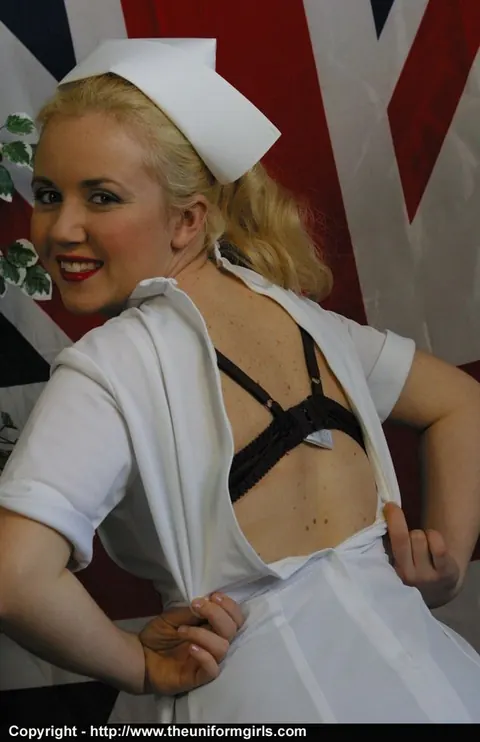 British Blonde Nurse Undresses in Tan Stockings – photo 6 of 15
