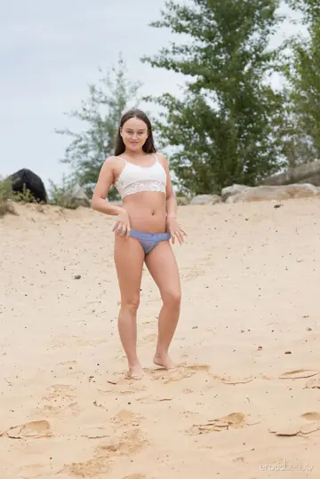 Brunette PAWG Undresses and Spreads on a Sandy Beach