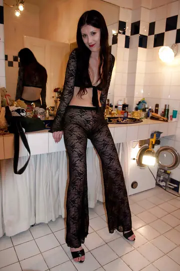 Pale Blonde MILF in Lingerie and Heels Poses in the Bathroom
