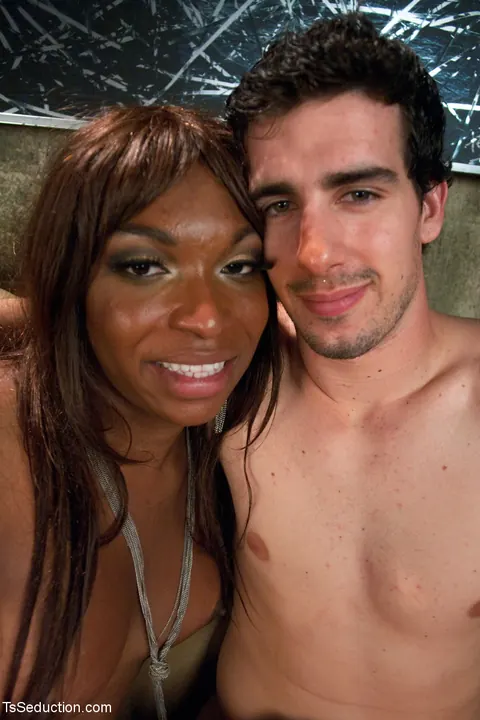 Trans Woman Strips Nude and Poses Arching Her Back Beside Partner – photo 18 of 20