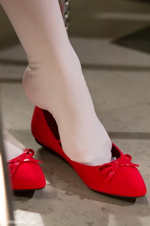 Jodi Taylor: Brunette and Redhead in Socks Dominate a Bound Man with Their Feet – photo 2 of 20