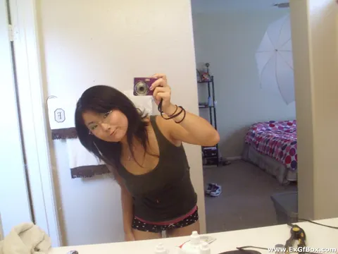 Asian Woman with Big Tits Pulls Panties Aside in Selfie – photo 1 of 20