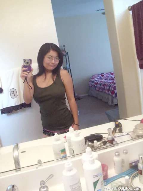 Asian Woman with Big Tits Pulls Panties Aside in Selfie – photo 2 of 20