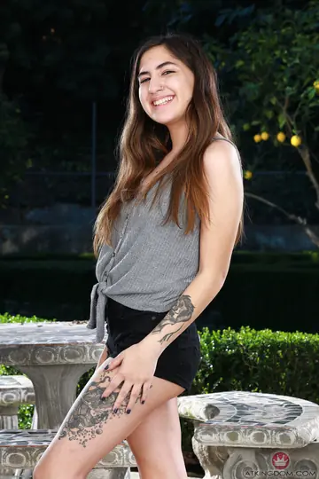 Brunette in Shorts Fingers Her Ass Outdoors