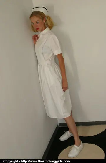Thick Blonde Nurse Strips Out of Her Skirt in Stockings