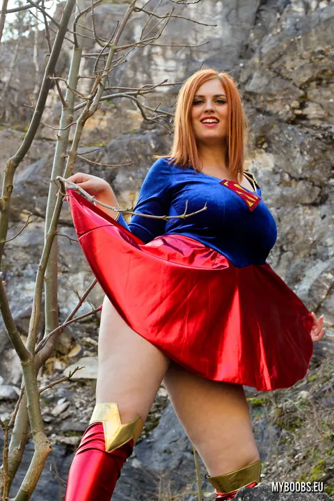 Alexsis Faye: Tall Redhead BBW Strips Out of Her Superman Costume Outdoors – photo 5 of 16