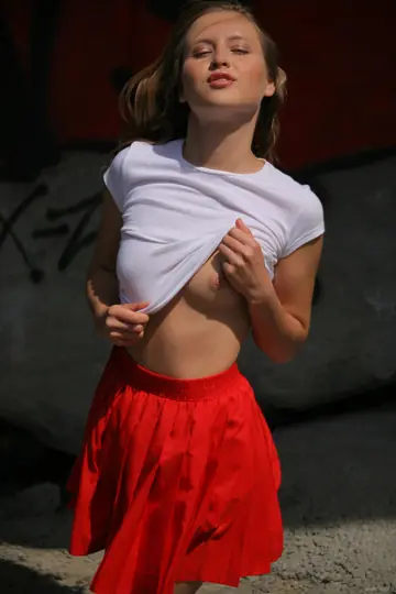 Milane Blanc – Slim Blonde Strips Out of Her Skirt Outdoors