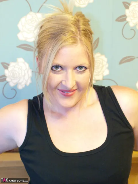 Thick Blonde MILF Strips to Lingerie and Keeps Boots On – photo 3 of 16