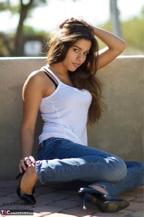 Busty Brunette in Jeans and High Heels Spreads Outdoors – photo 13 of 16