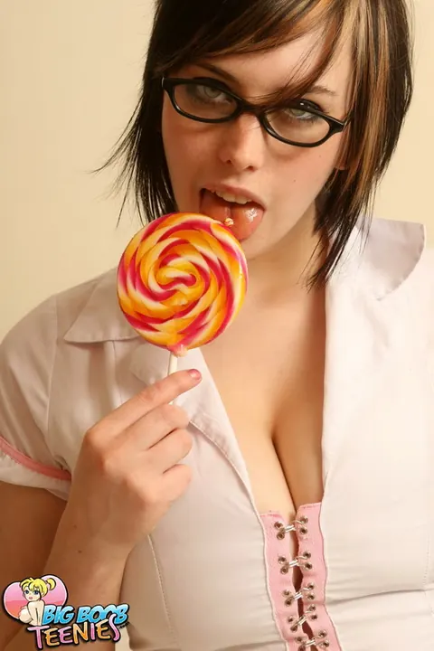 Busty Brunette in Heels and Glasses Cups Her Tits – photo 3 of 16