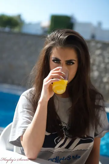 British Brunette Unties Her Bikini Top at the Pool