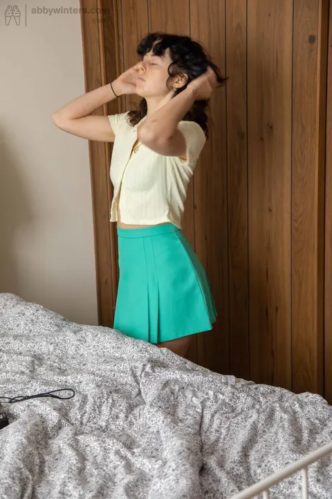 Skinny Australian Curly Babe Poses in a Skirt and Panties – photo 20 of 20