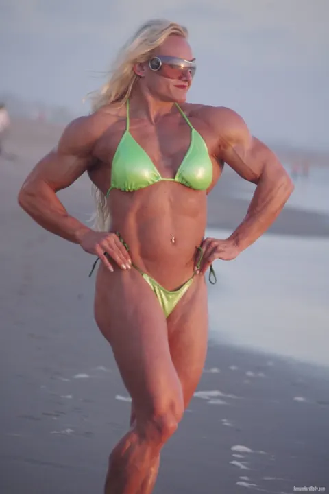Brigita Brezovac: European MILF Flexes Her Muscles in a Bikini and Glasses Outdoors – photo 19 of 20