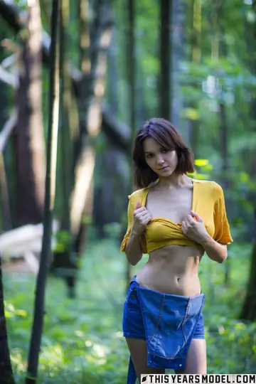 Lara Masier – Mature Brunette MILF with Big Natural Tits Strips in the Forest