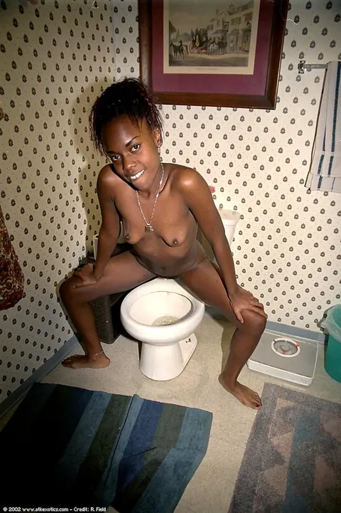 Petite Ebony Brunette Poses and Spreads Her Legs Clothed – photo 17 of 20