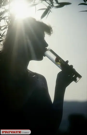 Busty Thick Woman Plays with a Dildo Outdoors