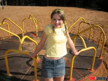 Woman in a Skirt and Lingerie Flashes Her Panties at the Playground